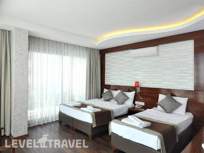Фотография Uk Blue Coast (Ex.Grand Bayar Beach Hotel) (Adults Only 18+)