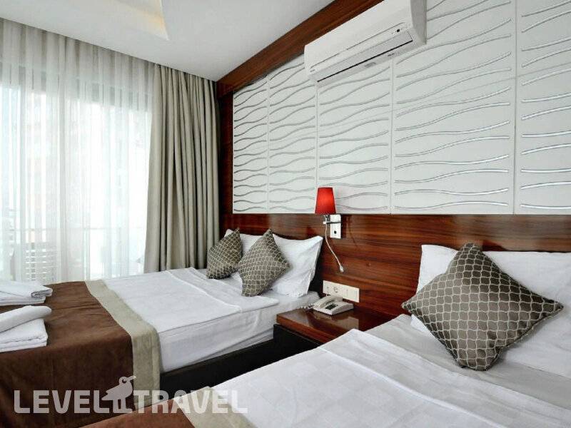 Фотография Uk Blue Coast (Ex.Grand Bayar Beach Hotel) (Adults Only 18+)