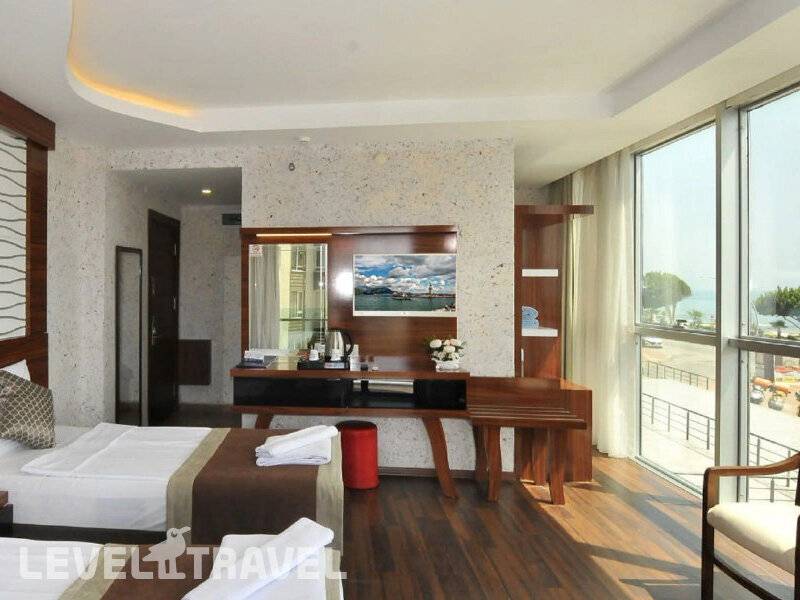 Фотография Uk Blue Coast (Ex.Grand Bayar Beach Hotel) (Adults Only 18+)