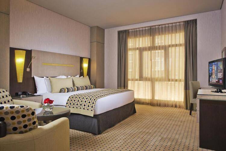Time Grand Plaza Hotel