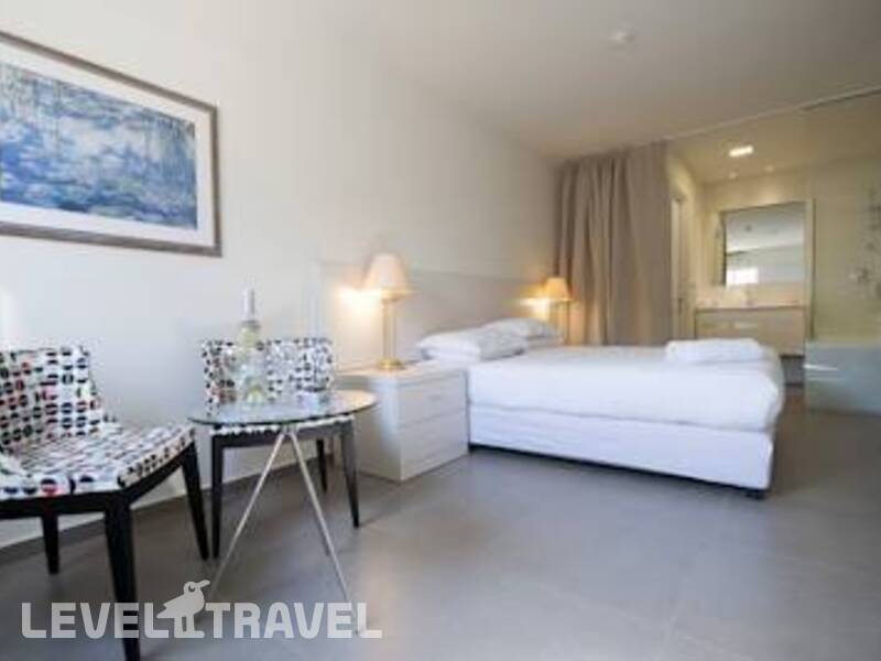 Фотография Q Hotel Village
