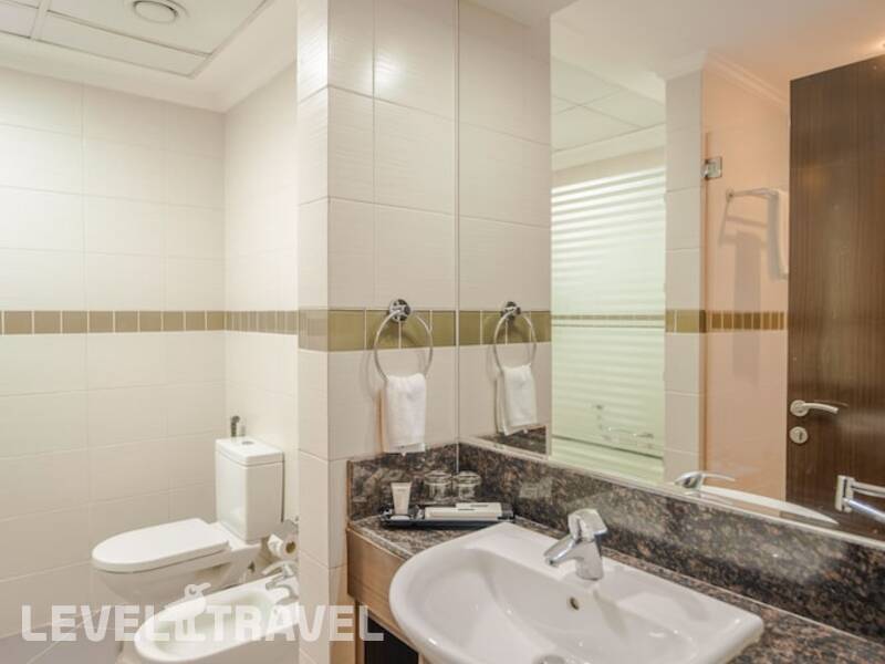 Фотография Icon Deluxe Hotel (Ex. Abidos Hotel Apartment Al Barsha)
