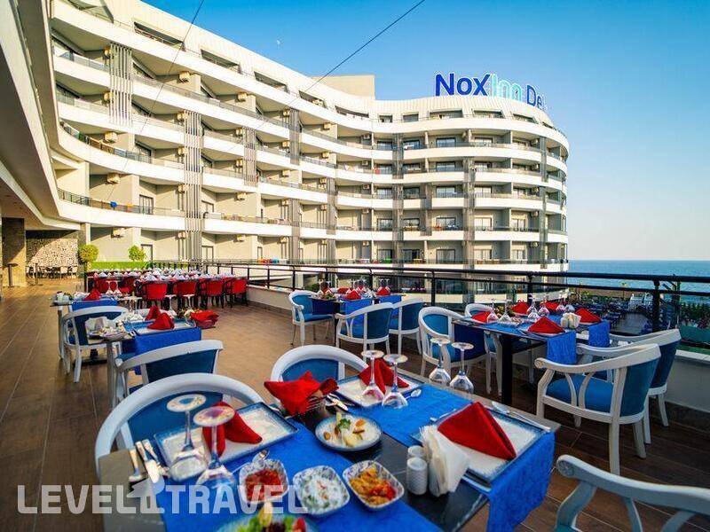 Фотография Noxinn Deluxe Hotel