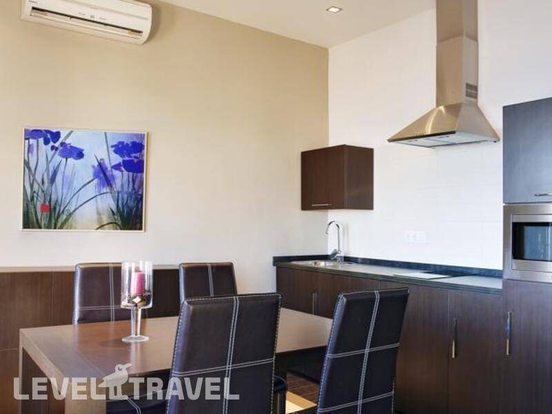 Фотография Apartamentos Pueblo Acantilado Suites