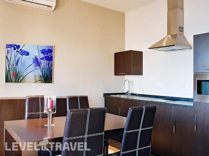 Фотография Apartamentos Pueblo Acantilado Suites