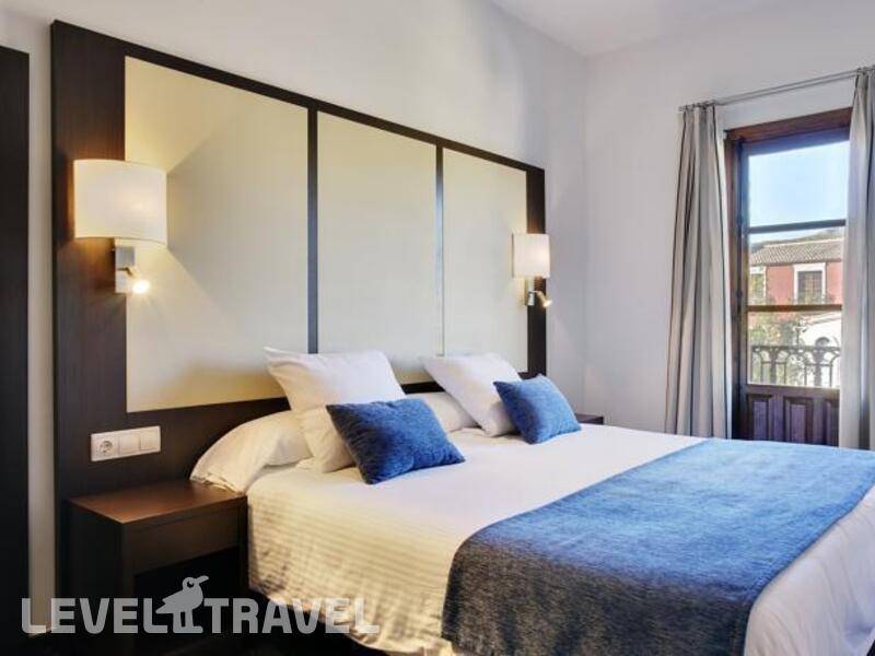Фотография Apartamentos Pueblo Acantilado Suites