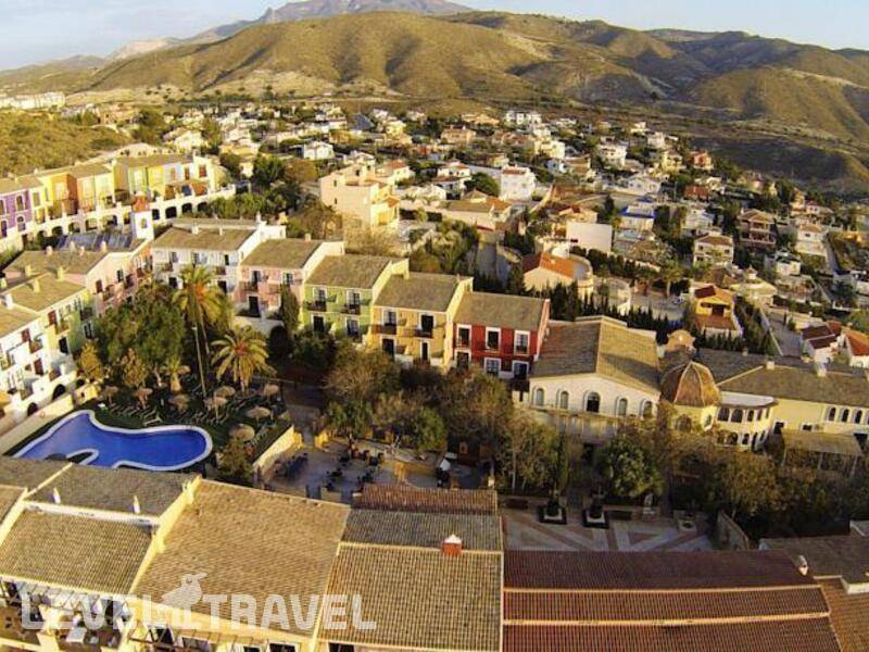 Фотография Apartamentos Pueblo Acantilado Suites