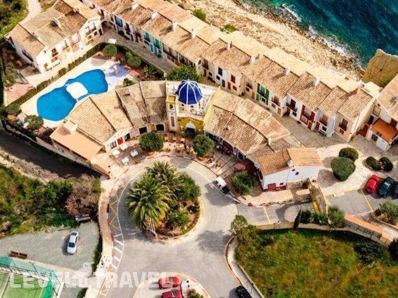 Фотография Apartamentos Pueblo Acantilado Suites