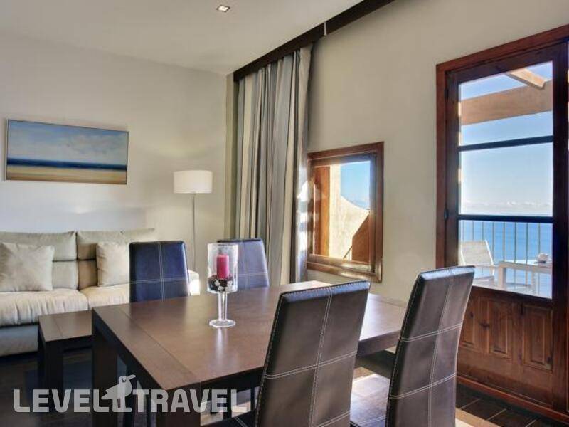 Фотография Apartamentos Pueblo Acantilado Suites