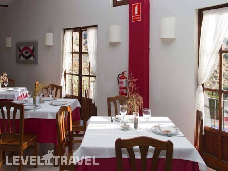 Фотография Apartamentos Pueblo Acantilado Suites