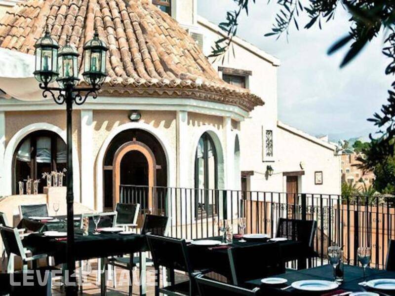Фотография Apartamentos Pueblo Acantilado Suites