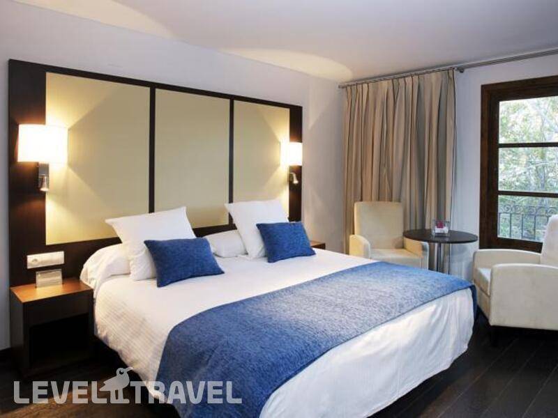 Фотография Apartamentos Pueblo Acantilado Suites