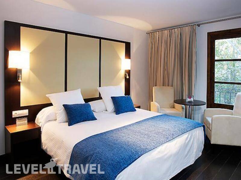 Фотография Apartamentos Pueblo Acantilado Suites
