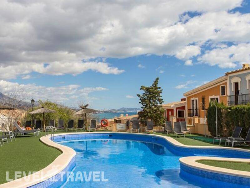 Фотография Apartamentos Pueblo Acantilado Suites