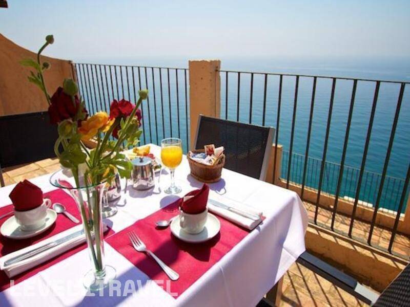 Фотография Apartamentos Pueblo Acantilado Suites