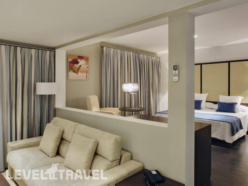 Фотография Apartamentos Pueblo Acantilado Suites