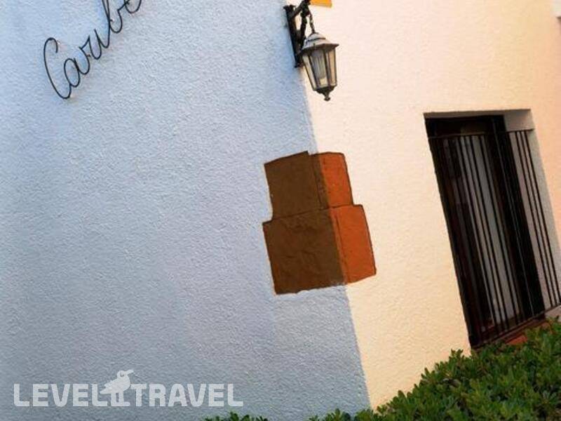 Фотография Apartamentos Caribe Lloret