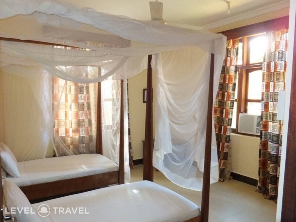 фотографии отеля Mnarani Beach Cottage в Танзания(Нунгви Бич) - фото №29