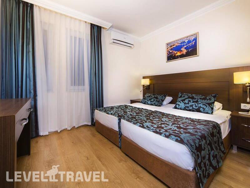 Фотография Parador Suit Hotel