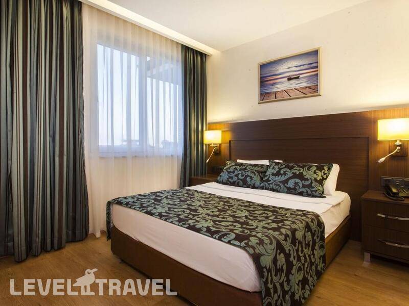 Фотография Parador Suit Hotel