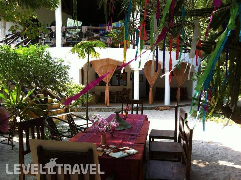 Фотография Casa Umoja Beach Guesthouse
