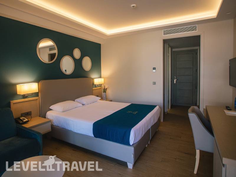 Фотография Almyros Beach Resort & Spa