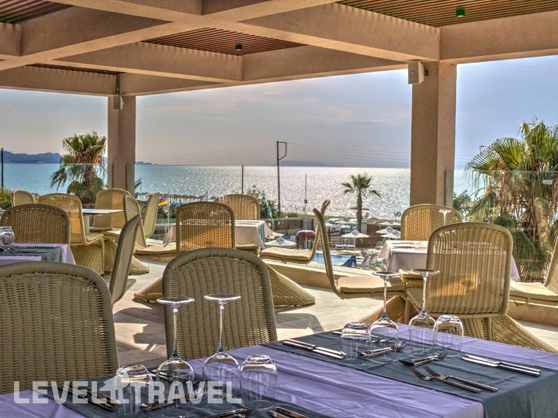 Фотография Almyros Beach Resort & Spa