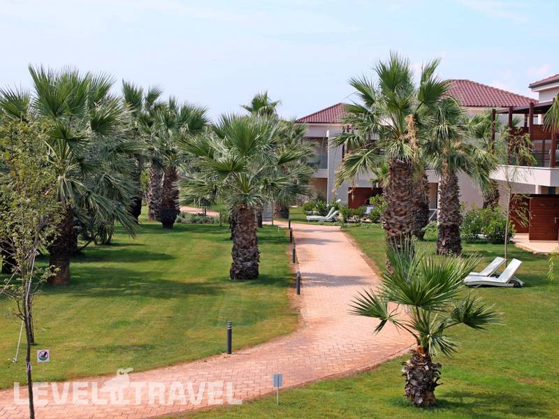 Фотография Almyros Beach Resort & Spa