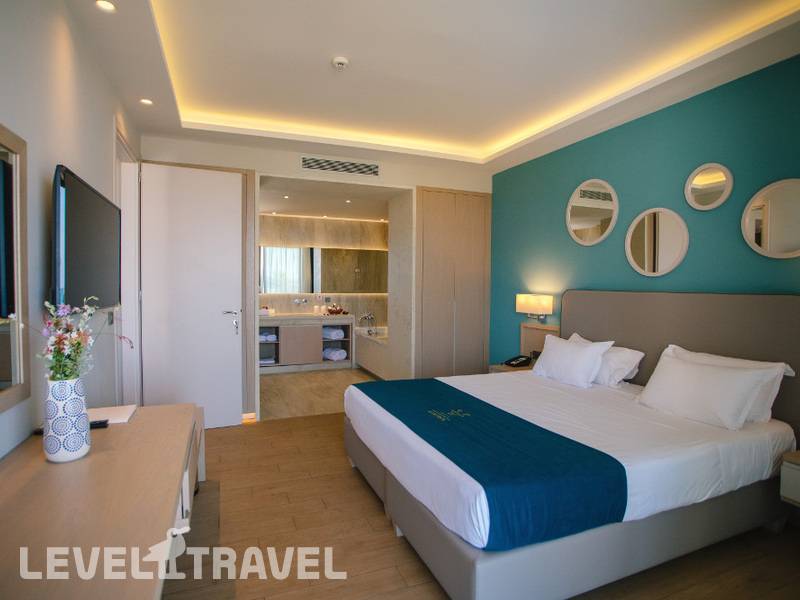 Фотография Almyros Beach Resort & Spa