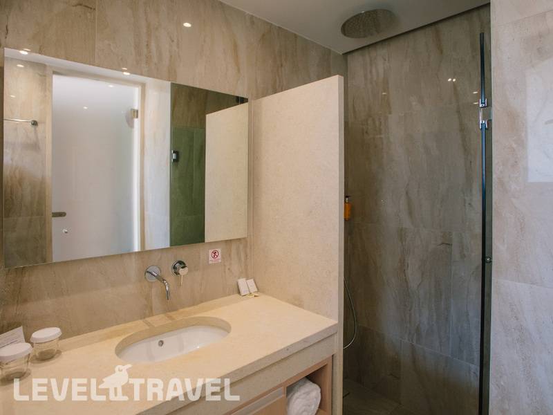 Фотография Almyros Beach Resort & Spa
