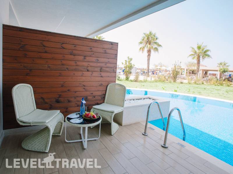 Фотография Almyros Beach Resort & Spa