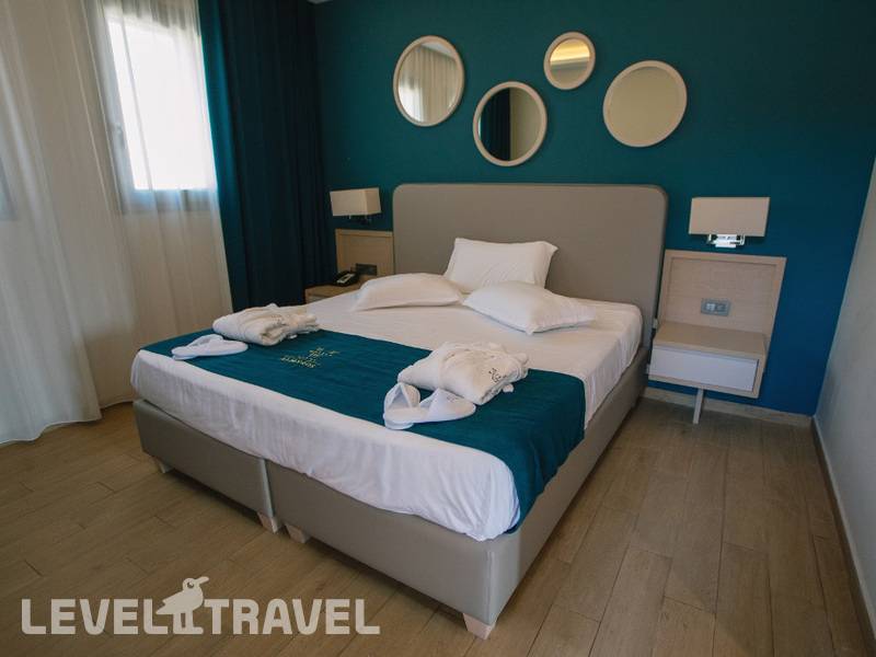 Фотография Almyros Beach Resort & Spa