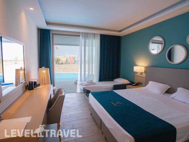 Фотография Almyros Beach Resort & Spa