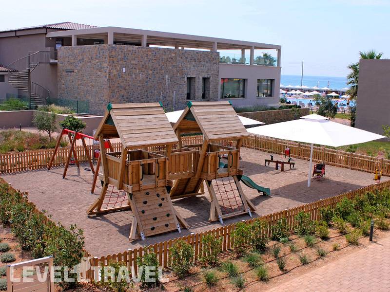 Фотография Almyros Beach Resort & Spa
