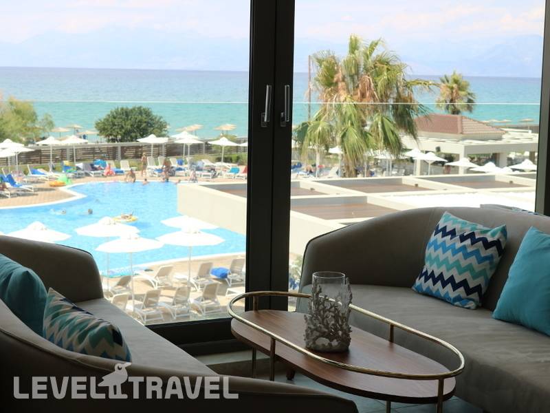 Фотография Almyros Beach Resort & Spa