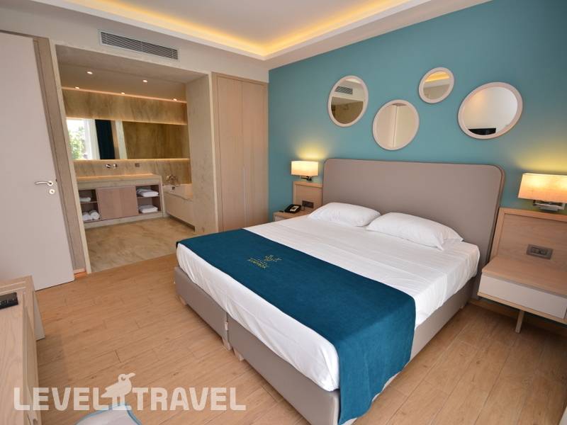 Фотография Almyros Beach Resort & Spa