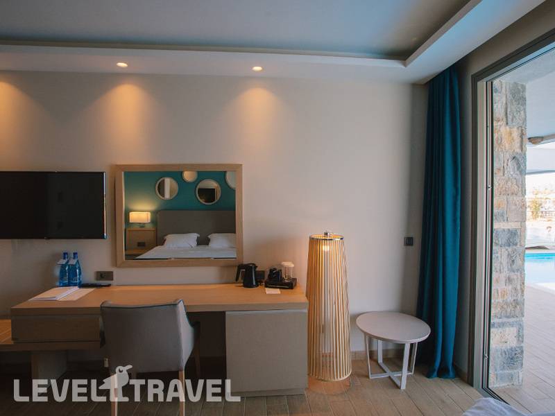 Фотография Almyros Beach Resort & Spa