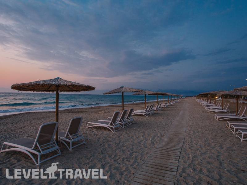 Фотография Almyros Beach Resort & Spa