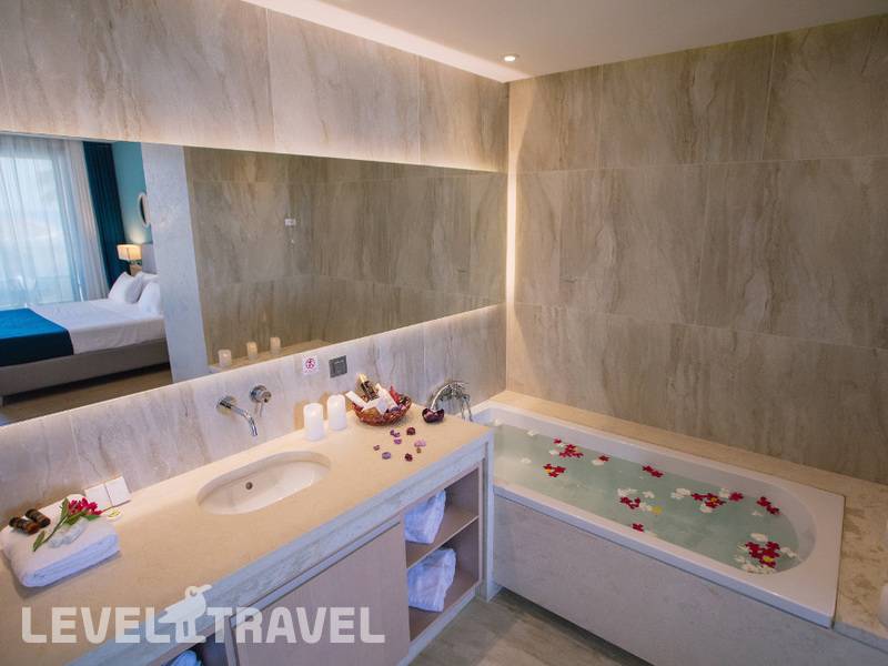 Фотография Almyros Beach Resort & Spa
