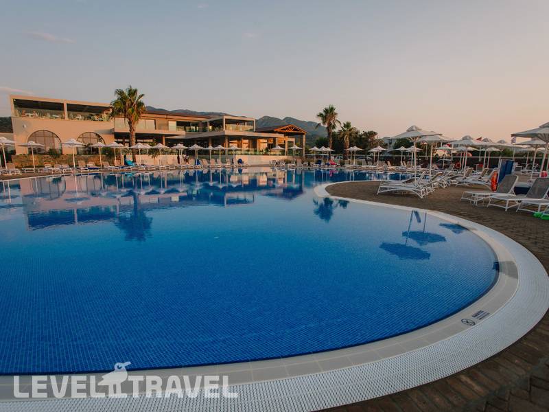 Фотография Almyros Beach Resort & Spa