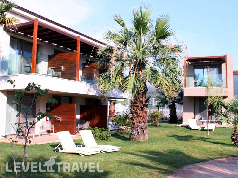 Фотография Almyros Beach Resort & Spa