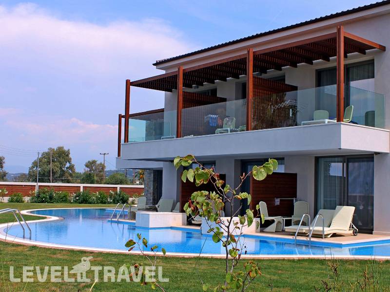 Фотография Almyros Beach Resort & Spa