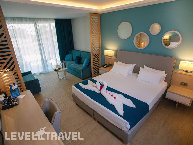 Фотография Almyros Beach Resort & Spa