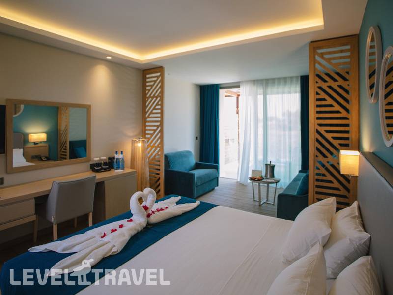 Фотография Almyros Beach Resort & Spa