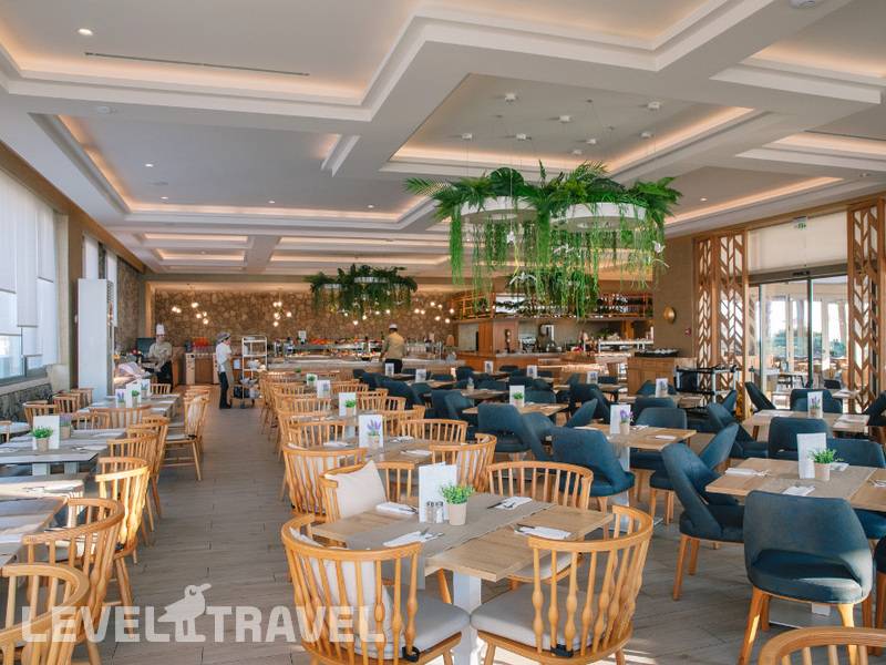 Фотография Almyros Beach Resort & Spa