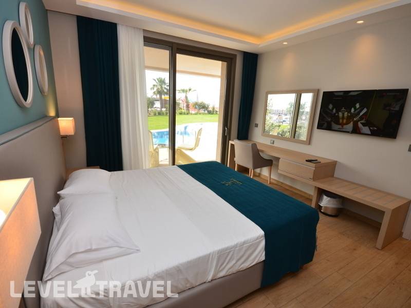 Фотография Almyros Beach Resort & Spa