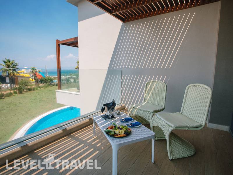 Фотография Almyros Beach Resort & Spa