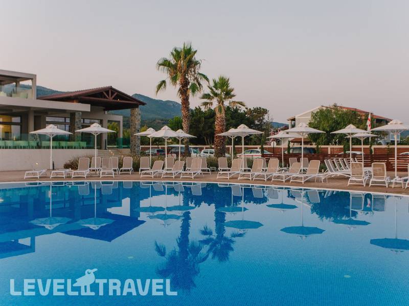 Фотография Almyros Beach Resort & Spa