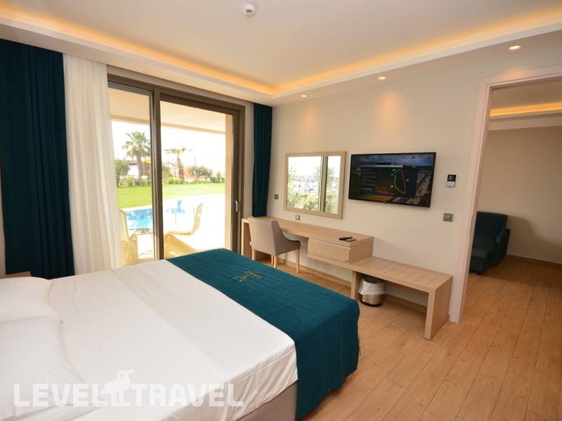 Фотография Almyros Beach Resort & Spa