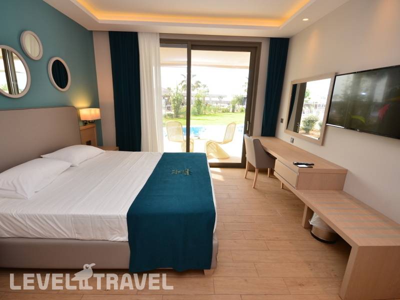 Фотография Almyros Beach Resort & Spa